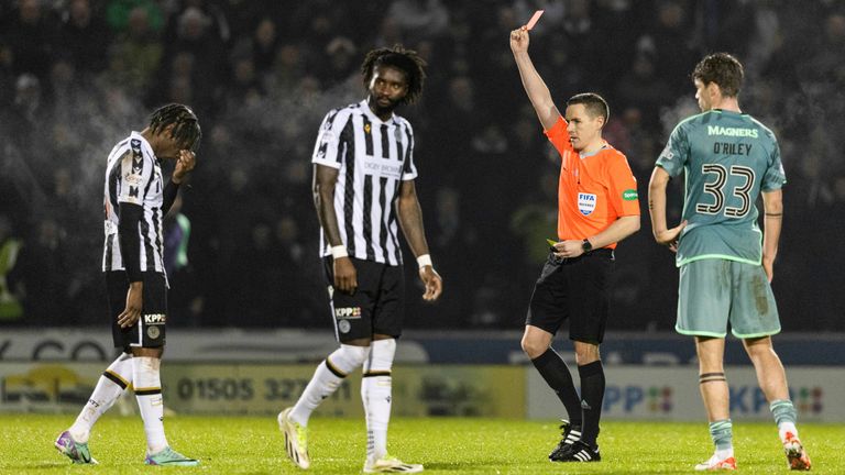 PAISLEY, SCOTLAND - JANUARY 02: Referee David Munro shows St Mirren&#39;s Toyosi Olusanya a red card for a high boot on Celtic&#39;s Joe Hart during a cinch Premiership match between St Mirren and Celtic at the SMiSA Stadium, on January 02, 2024, in Paisley, Scotland. (Photo by Craig Foy / SNS Group)